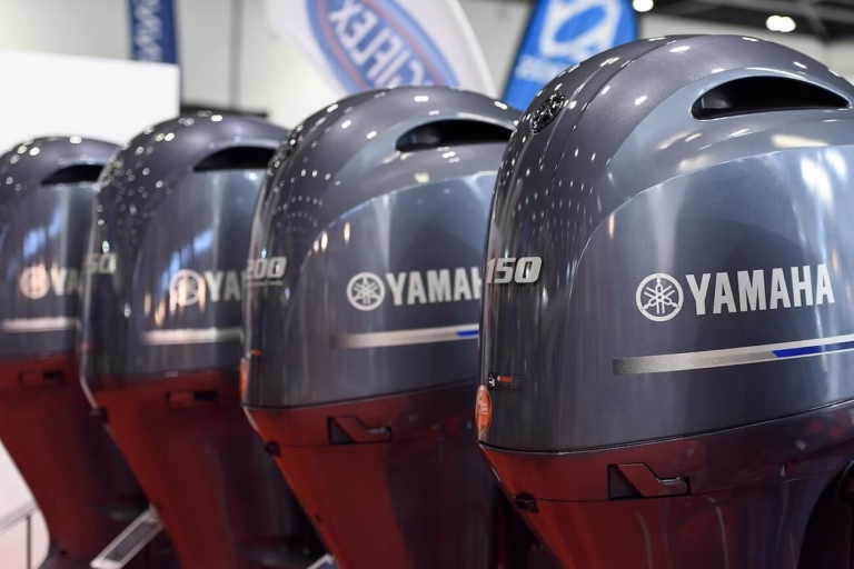 Yamaha outboard motors arranged in a line for pre-sale orders